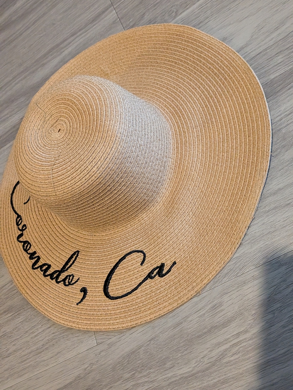 Wide-Brim Straw Sun Hat in Tan with Black Script